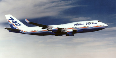 Cathay Pacific Airways' Boeing 747-400 jumbo jet flying over the clouds.